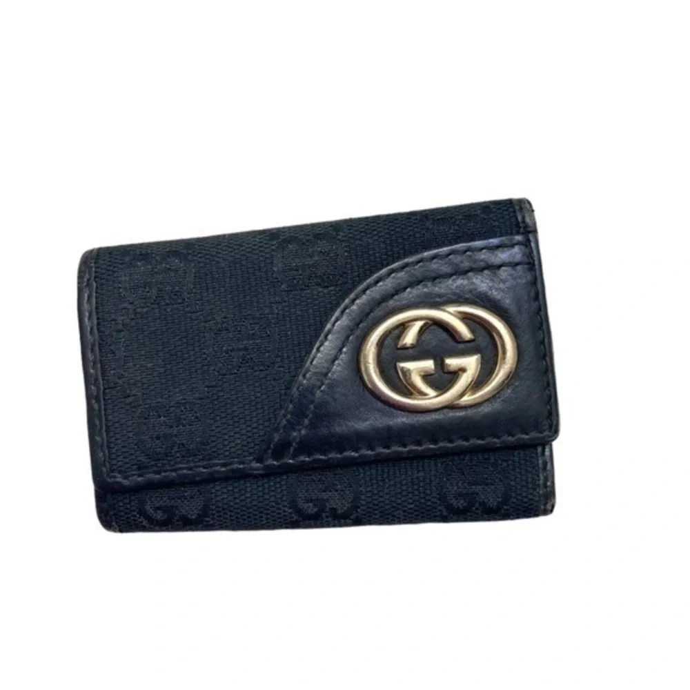 Gucci black signature canvas leather key holder